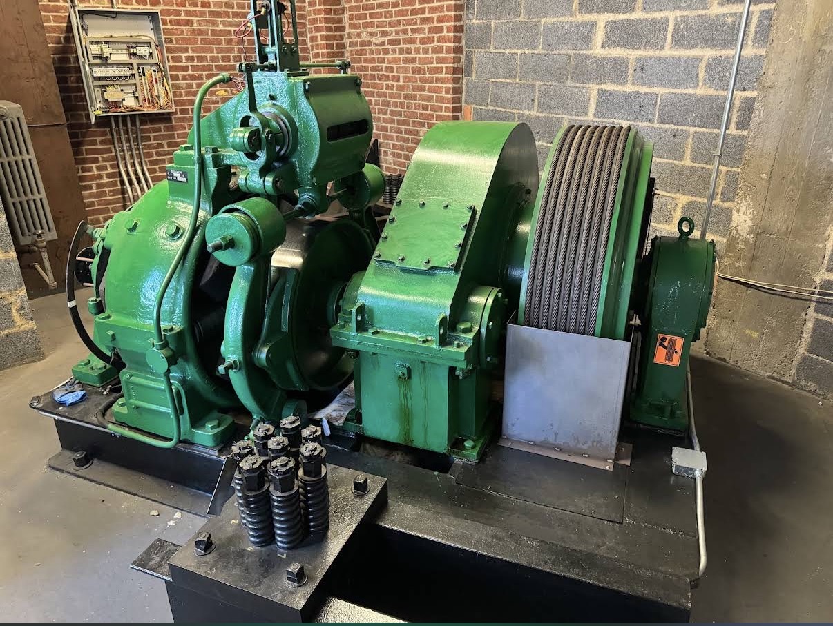 Elevator motor room — green machine